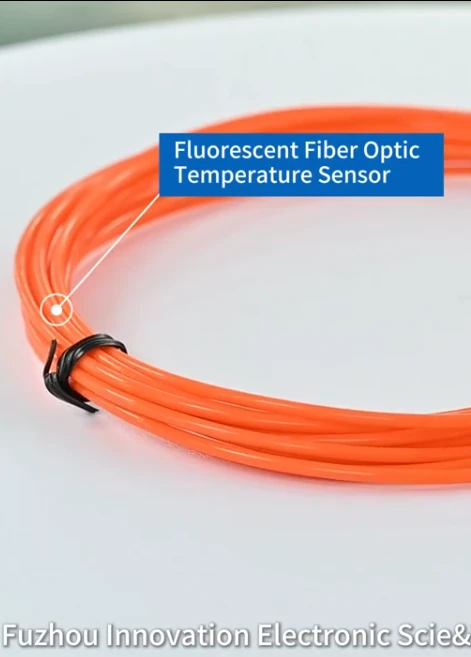 Fluorescent fiber optic temperature sensor with coiled orange optical probes